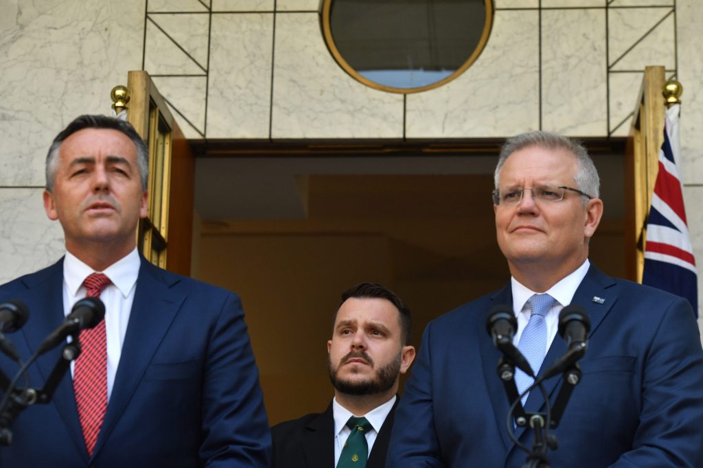 Minister for Veterans' Affairs Darren Chester, Liberal member for Herbert, Philip Thomson, and Prime Minister Scott Morrison announce the appointment of a national commissioner to investigate suicides among Defence Force personnel and veterans. (Photo: AAP Image/Mick Tsikas) 