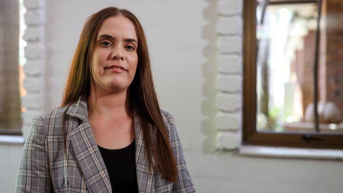 Kalyra Michelutti quit her job and deferred university to take on the parental role for her young sister. Photo: ABC