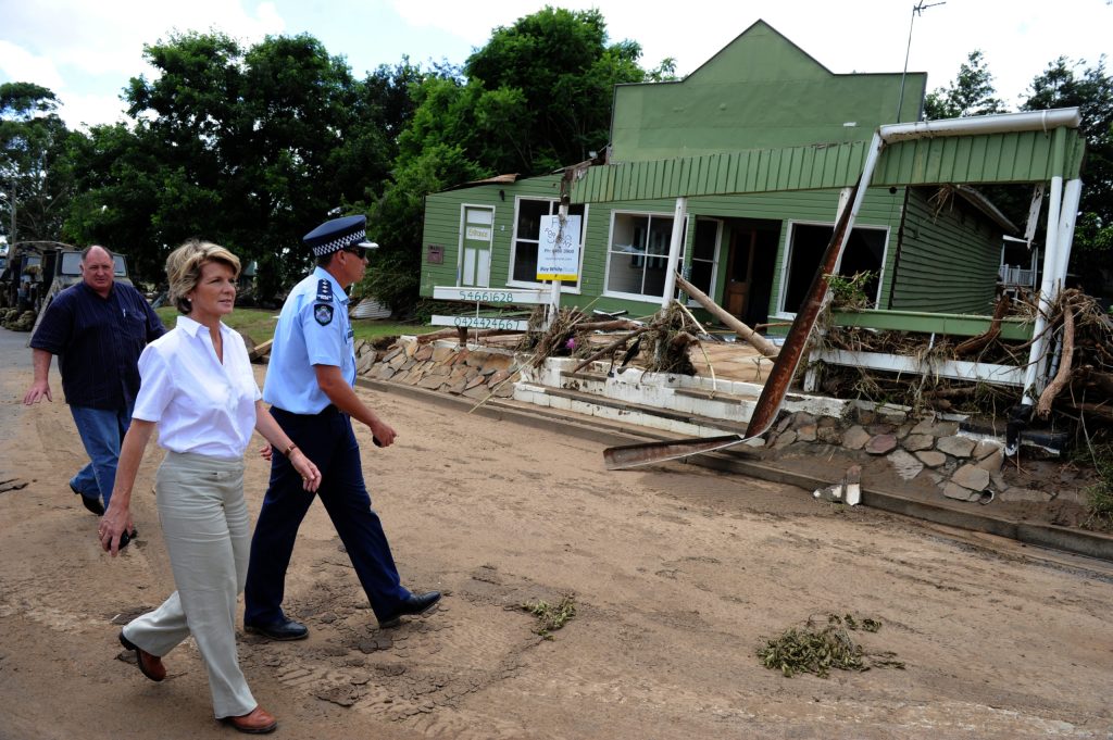 then-federal deputy opposition leader Julie Bishop tours the township of Grantham following the devastating floods that ripped through the Lockyer Valley in January 2011. (Photo: AAP Image/Dean Lewins) 