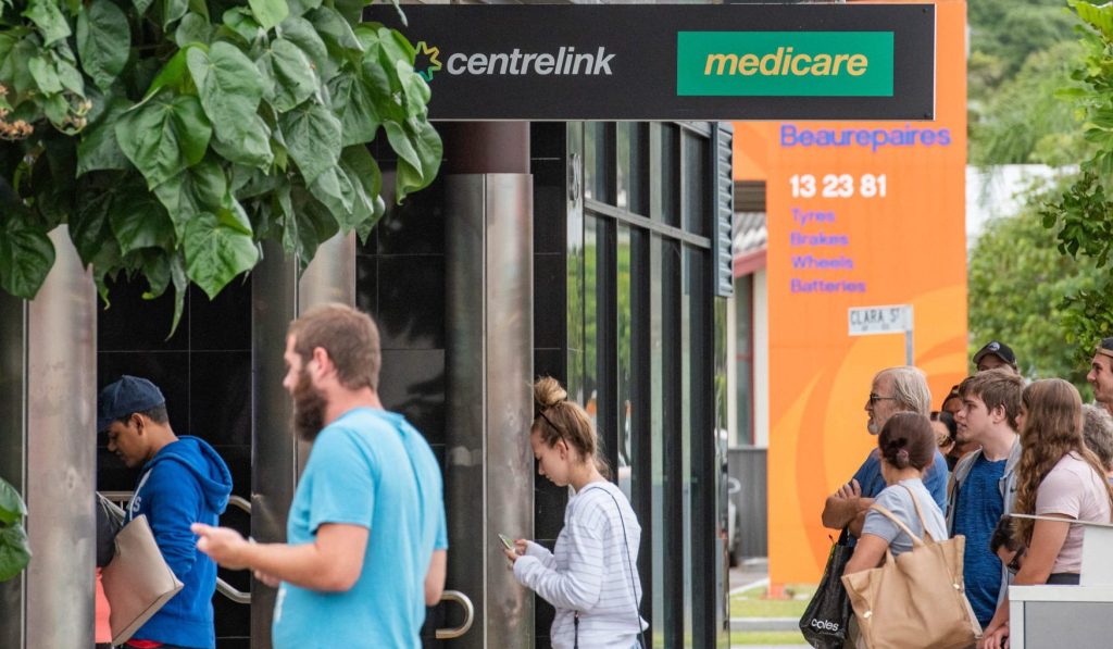 Australians queue at Centrelink during the COVID-19 pandemic. (Photo by Florent Rols / SOPA Images/Sipa USA)