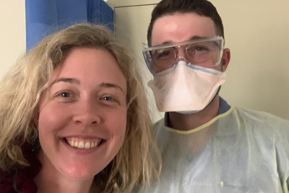 Bridget Wilkins with a doctor during her hospital isolation.

Supplied: Bridget Wilkins