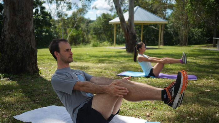 Social-distancing restrictions mean John McNaughton can only train one person at a time outdoors. Photo: ABC