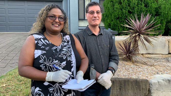 Vicky and Siamak Mohajerin did not know a lot of their neighbours before they offered to help them. Photo: ABC