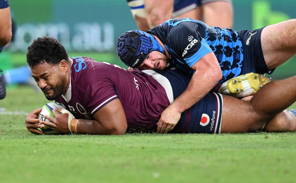 Taniela Tupou (left) of the Reds scores a try during the Round 7 Super Rugby match between the Queensland Reds and the Bulls at Suncorp Stadium in Brisbane, Saturday, March 14, 2020. (AAP Image/Darren England) 