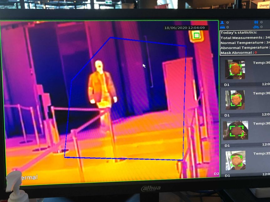 Every visitor to National Australia Bank's super-office in Melbourne has their temperature is taken and logged. (Photo: ABC News: Madeleine Morris)