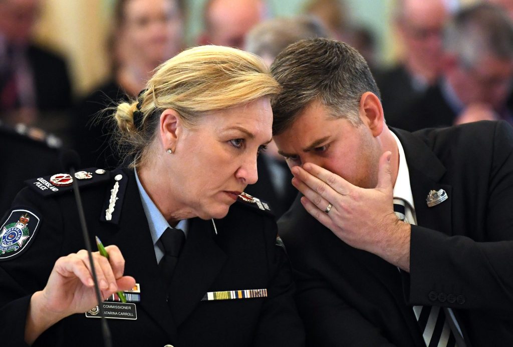 Queensland Police Minister Mark Ryan (right) and Commissioner Katarina Carroll. Ryan will support the renewal of her contract. (Photo: AAP Image/Dan Peled) . 