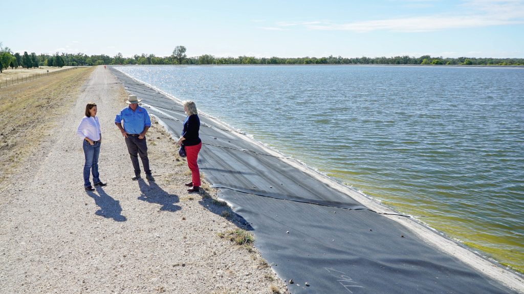 Opposition Leader Deb Frecklington and Member for Warrego Ann Leahy inspect a dam built for gas extraction on the property of farmer Simon Drury, near Miles.