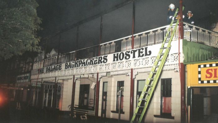 Firefighters work on the building following the fatal fire in 2000. (Photo: ABC)