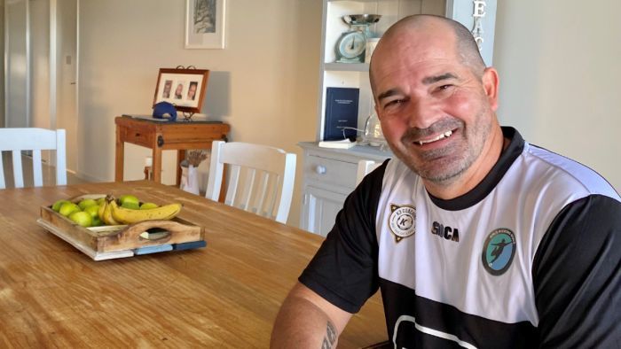 Refurbishing furniture allows Jason Sparrow time to "centre myself". Photo: ABC