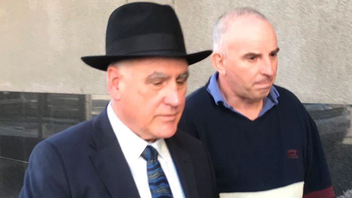 Paul Montgomery (right) appeared briefly in the Brisbane Magistrates Court on one count of fraud. Photo: ABC