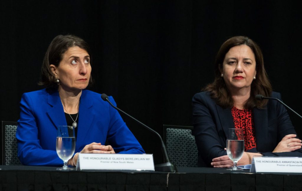 NSW Premier Gladys Berejiklian (left) and Queensland Premier Annastacia Palaszczuk. (Photo: AAP Image/Marc McCormack)