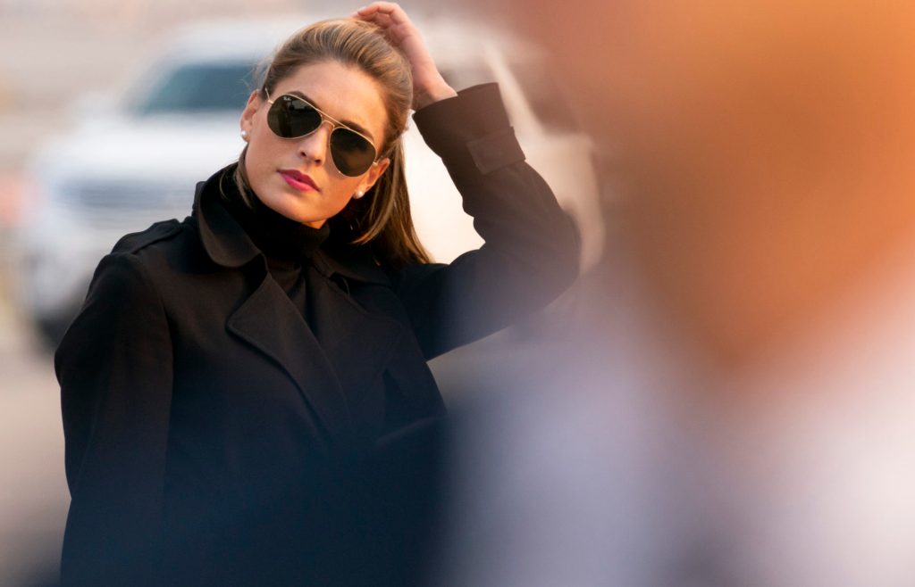 Counselor to the President Hope Hicks arrives with President Donald Trump at Reno-Tahoe International Airport in Reno, Nev., Saturday, Sept. 12, 2020, to travel to a rally in Minden, Nev. (AP Photo/Andrew Harnik)
