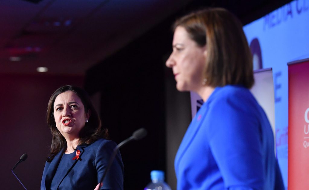Queensland Premier Annastacia Palaszczuk (left)  and Opposition Leader Deb Frecklington (right) are seen during the leaders debate at the Queensland Media Clubon Friday.. (AAP Image/Darren England) 