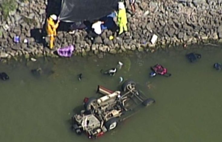 Thumbnail for Police tell of panicked attempts to free two children from vehicle flipped into dam