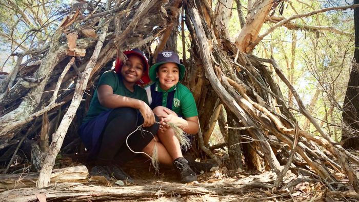 Teachers incorporate things found in nature like rocks, sticks and trees into lessons for music, math and science. Photo: ABC