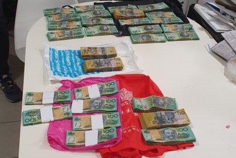 Thumbnail for Brisbane woman charged with money laundering after police seize $260,000 in cash
