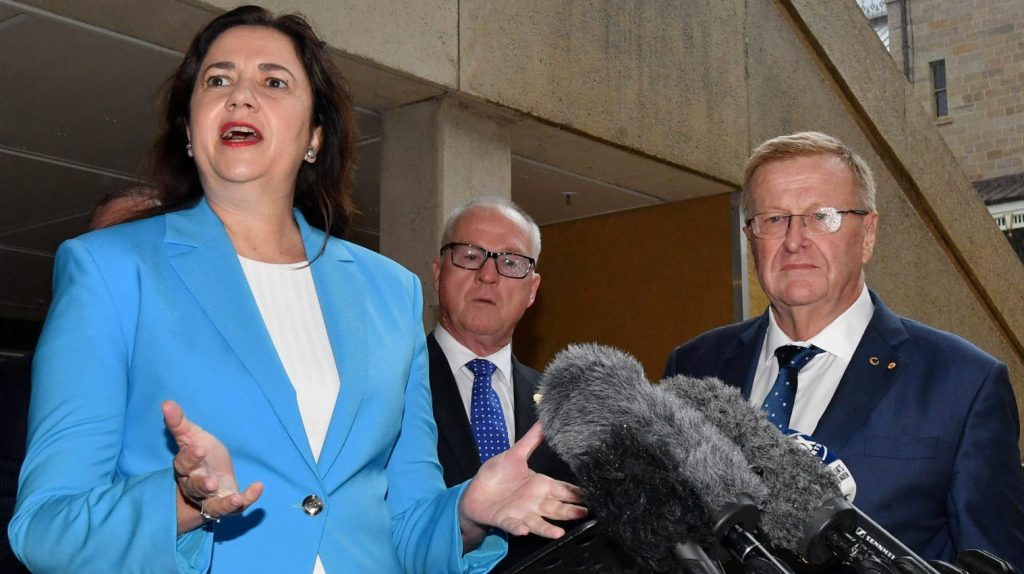 Queensland Premier Annastacia Palaszczuk, Sunshine Coast Mayor Mark Jamieson (centre) and Australian Olympic Committee President John Coates. (AAP Image/Darren England)