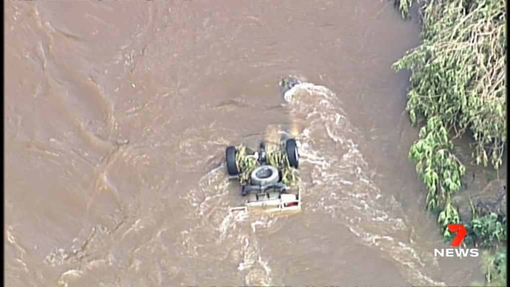 Thumbnail for Missing man’s ute found in Canungra flood waters as NSW records first death from disaster