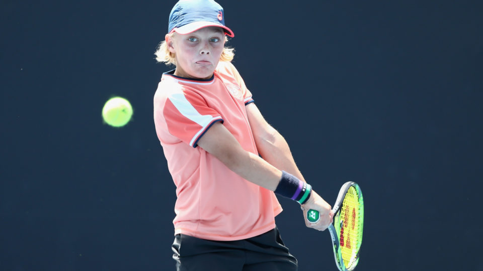 Like father, like son: Cruz Hewitt demonstrates a backhand that's a carbon copy of his famous dad's. (Photo, The New Daily)