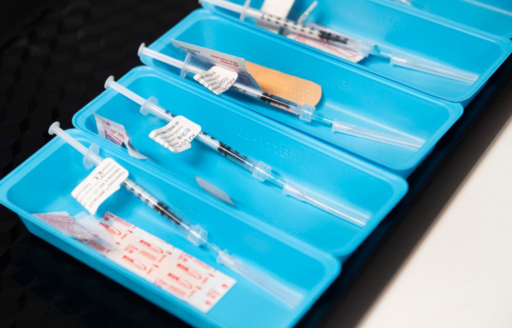 Australians have been offered a choice of vaccines in a bid to overcome hesitancy. (AAP Image/Nigel Hallett) 