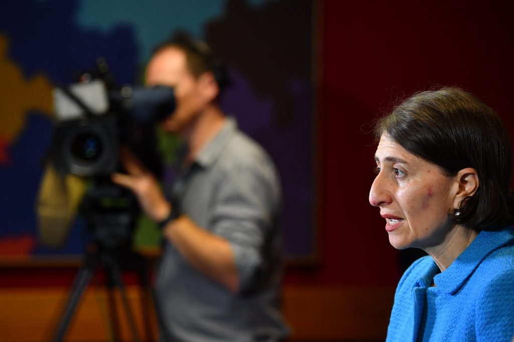 Thumbnail for Masks back on in Sydney; hotel quarantine named as source of mystery infection