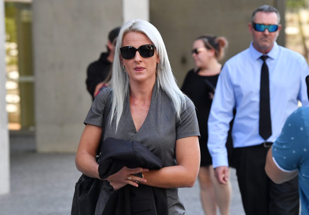 Allison Shorten (centre), sister of murder victim Daryl Corcoran leaving the Brisbane Supreme Court with family members. Photo: AAP Image/Darren England