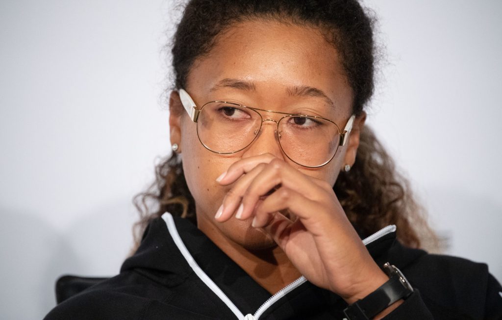 Japanese tennis player Naomi Osaka reacts during a press conference at the Stuttgart Open tennis tournament at the Porsche-Arena. Osaka has announced her withdrawal from Roland Garros. Photo: Marijan Murat/dpa