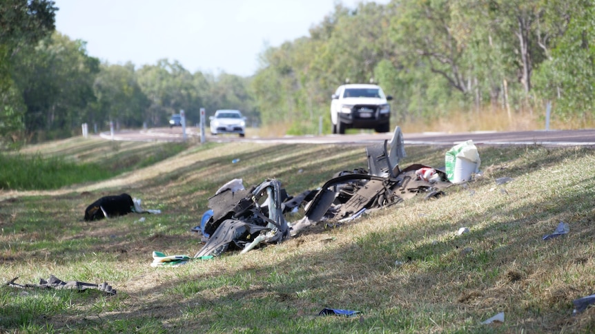 The wreckage of a car in the aftermath of two fatal accidents on the Bruce Highway north of Townsville.(ABC News: Nathalie Fernbach )