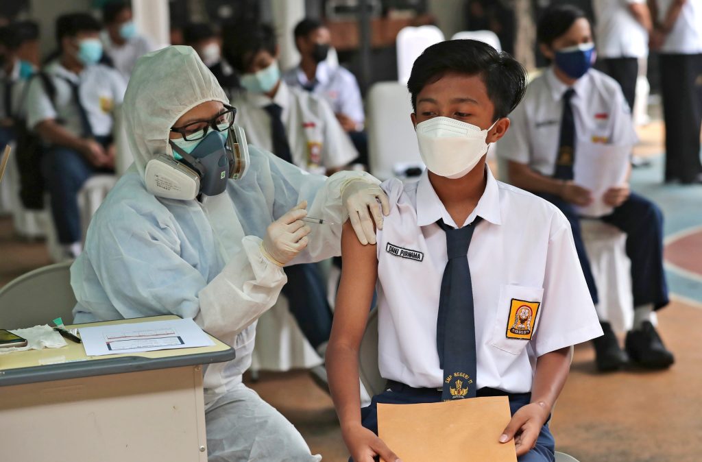 Thumbnail for World’s worst hotspot on our doorstep: Indonesia tops 50,000 cases a day