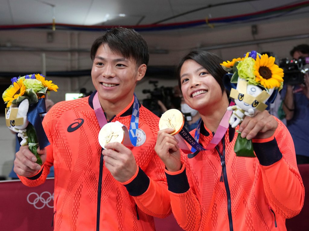 Thumbnail for Home-grown gold puts a new shine on troubled host city