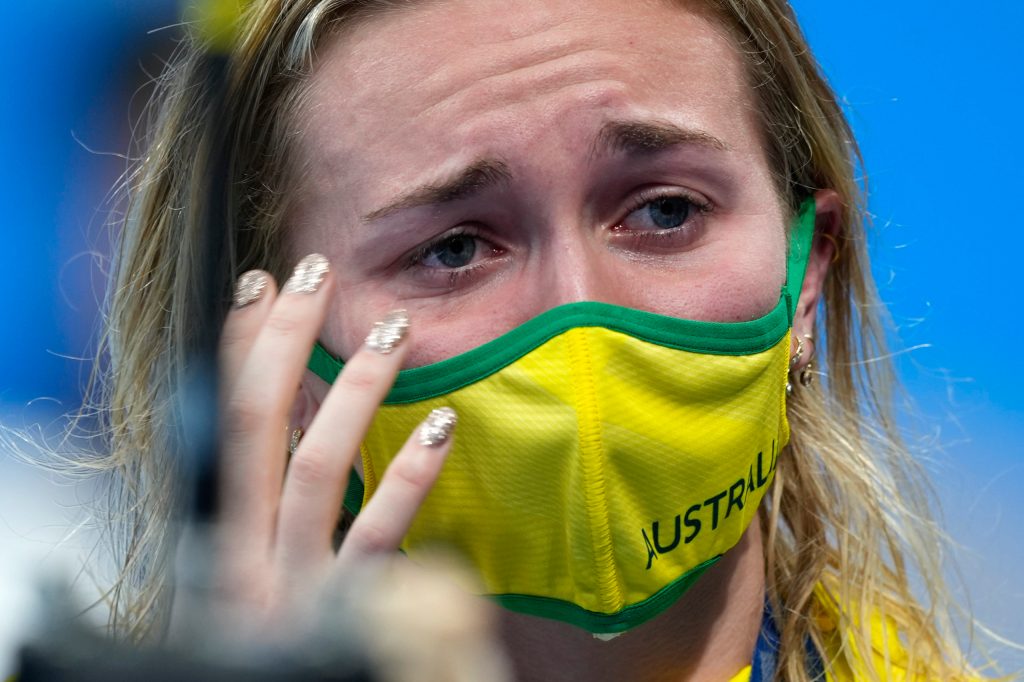 Tears of a champion - Ariarne Titmus  reacts after receiving her gold medal for the women's 200-metre freestyle final . (AP Photo/Martin Meissner)