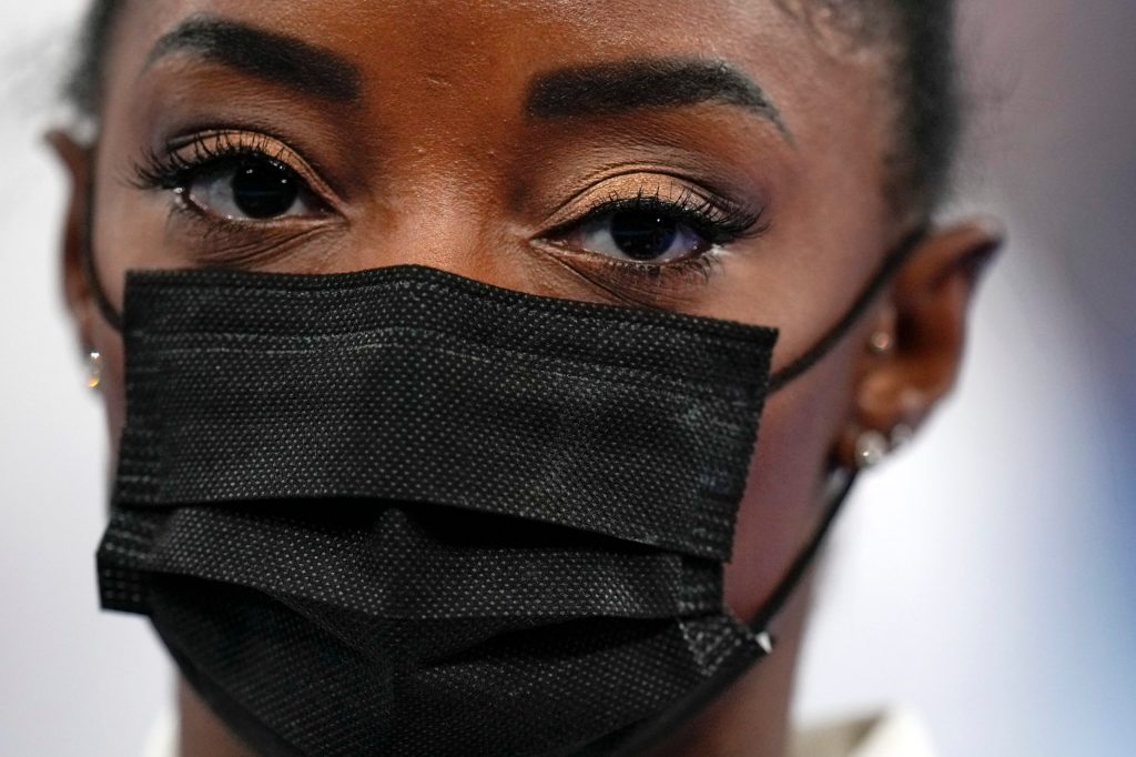Simone Biles, of the United States, looks on after pulling out of the artistic gymnastics women's final. (AP Photo/Gregory Bull)