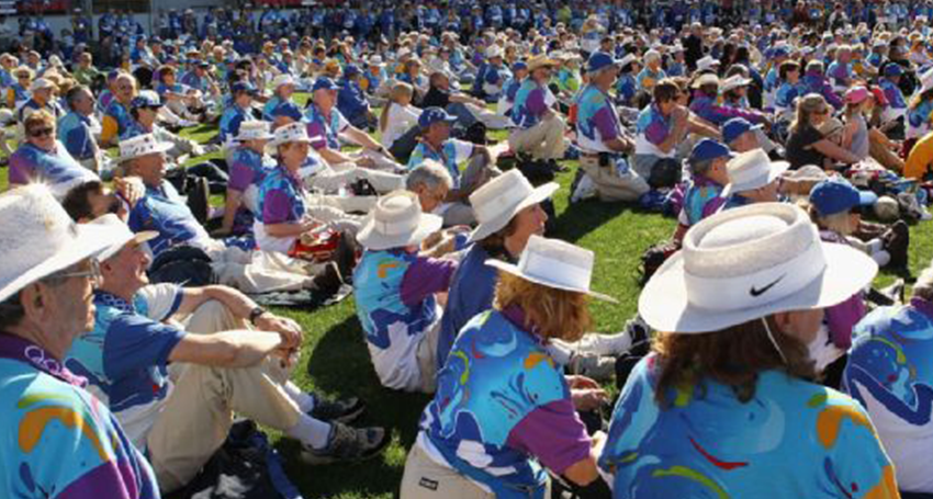 Sydney Olympic Volunteers at their 10-year reunion, their uniforms a prized possession. Volunteerism and community spirit will be one of the great spin-offs of the Brisbane 2032 Games (Image: AOC)