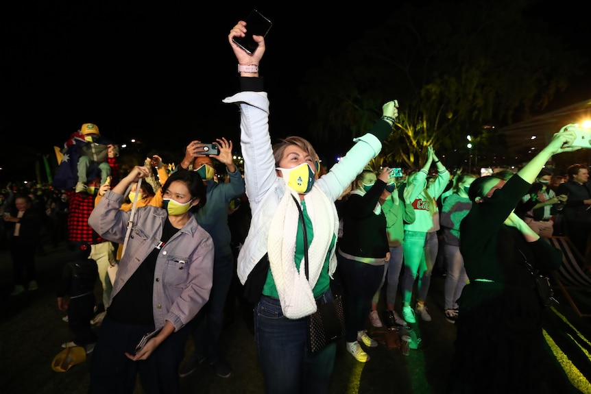 Like those who gathered at Southbank for Wednesday's announcement, all of Australia should applaud our hosting of the 2032 Olympics. (Photo: ABC)