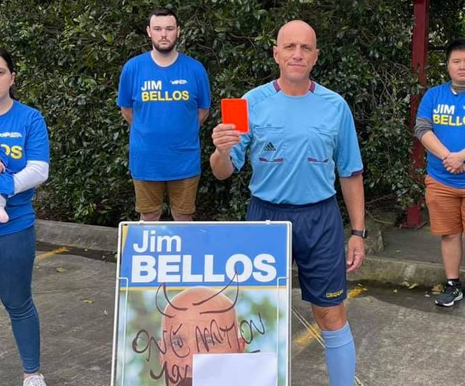 Liberal National Party candidate Jim Bellos (front holding red card) did not respond to a recent survey on Voluntary Assisted Dying. (Facebook)