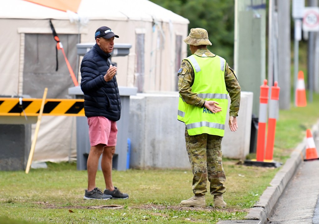 Defence Force personnel will return to the border on the Gold Coast, where they were a year ago, helping police enforce restrictions. (AAP Image/Dan Peled)