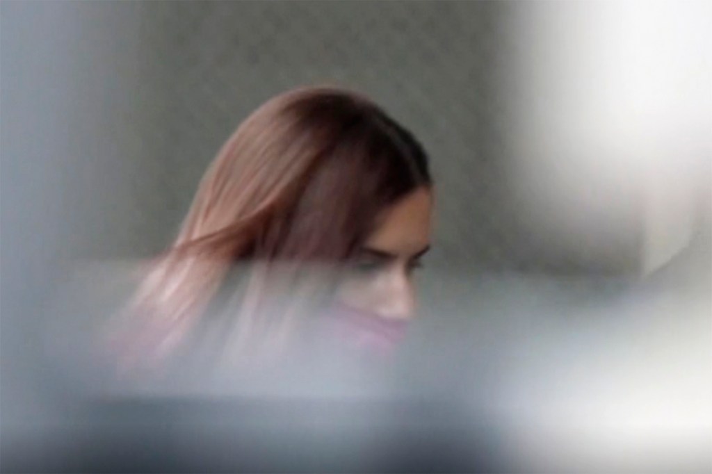 In this image made from video provided by NTV, Belarus Olympic sprinter Krystsina Tsimanouskaya enters the Polish embassy in Tokyo, Japan, Monday, Aug. 2, 2021. Tsimanouskaya plans to seek asylum in Poland, an activist group said Monday, after the athlete alleged that her team’s officials tried to force her to fly home, where she feared she wouldn’t be safe from an autocratic government that recently was accused of diverting a plane in order to arrest a dissident journalist. (NTV via AP)