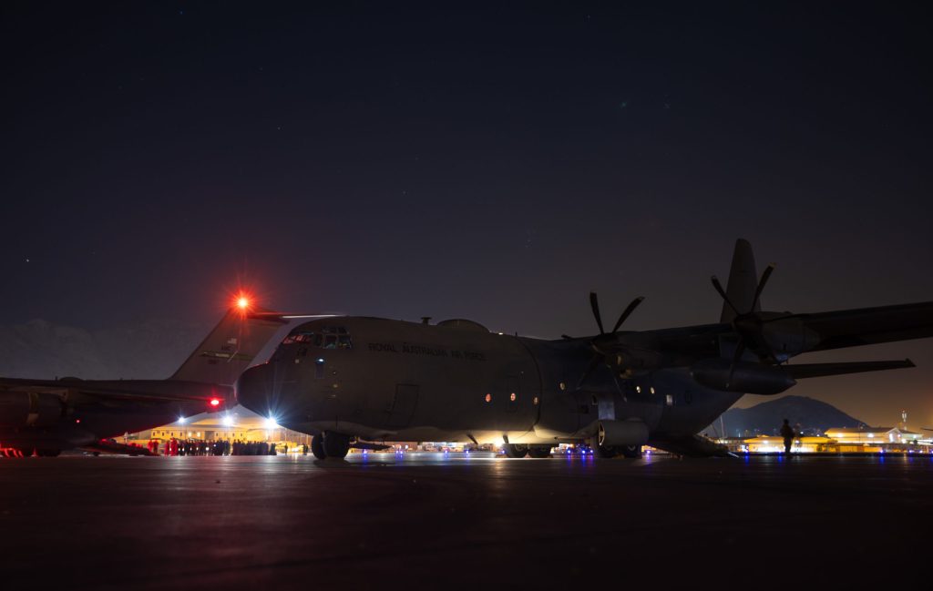 A supplied image obtained on Wednesday, August 18, 2021, of The first Australian Defence Force evacuation flight which has departed Kabul with 26 persons on board. A RAAF C-130 Hercules has successfully evacuated 26 people from Kabul airport, which was engulfed in chaos earlier in the week. (AAP Image/Supplied by Australian Defence Force) NO ARCHIVING, EDITORIAL USE ONLY