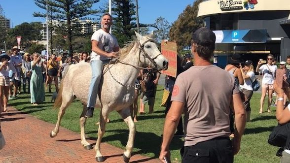 Police say further charges are likely against the man on horseback who incited Sunday's border riots (Photo: ABC North Coast: Hannah Ross)

