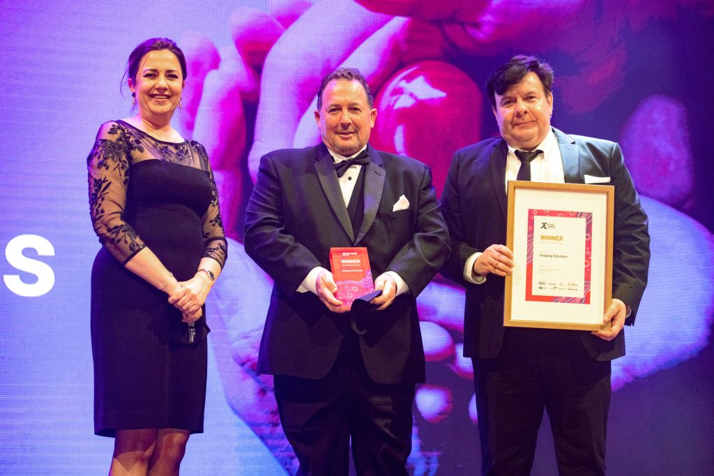 Premier Annastacia Palaszczuk with Imaging Solutions founder and chief executive officer Glenn Honey and deputy CEO John Kepeleris.