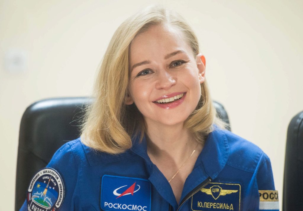 epa09505829 A handout photo made available on the official website of the Russian State Space Corporation ROSCOSMOS shows the International Space Station (ISS) expedition 66 crew member actress Yulia Peresild during a press conference at the Baikonur cosmodrome, Kazakhstan, 04 October 2021. The launch of the Soyuz MS-19 spaceship carrying the International Space Station (ISS) expedition 66 members, Russian cosmonaut Anton Shkaplerov, film director Klim Shipenko and actress Yulia Peresild, is scheduled for 05 October 2021. The Russian film crew plans to make a movie onboard the International Space Station.  EPA/ANDREY SHELEPIN/GCTC/ROSCOSMOS HANDOUT MANDATORY CREDIT HANDOUT EDITORIAL USE ONLY/NO SALES