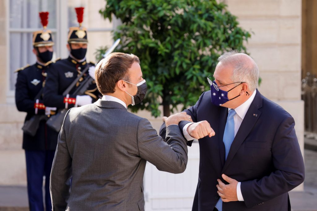 French President Emmanuel Macron welcomes Australian Prime Minister Scott Morrison at the Elysee Palace in Paris, France in June. Macron is now accusing the Australian PM of lying. (REUTERS/Pascal Rossignol)
