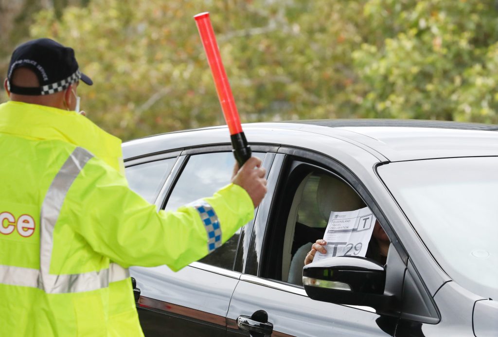 Scenes on the Gold Coast Highway at the Queensland and New South Wales border on the Gold Coast. (AAP Image/Jason O'Brien)