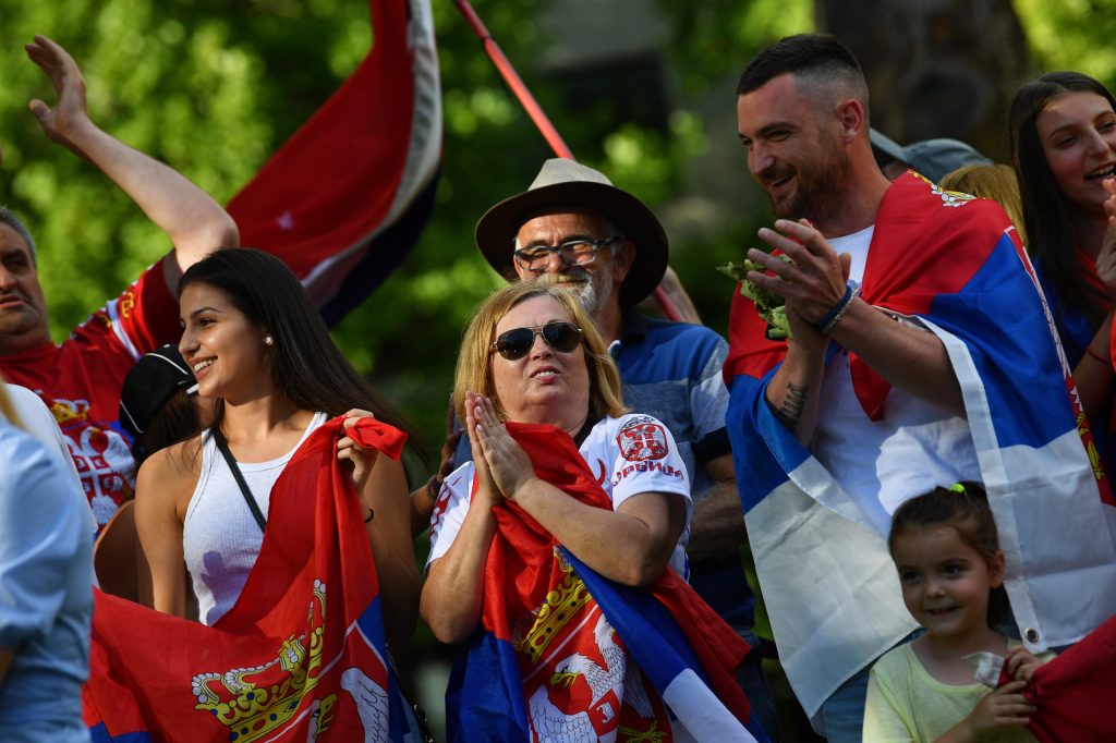 Supporters of Novak Djokovic outside of the Park hotel quarantine facility where Serbian tennis player is being detained in Melbourne. (AAP Image/James Ross) 