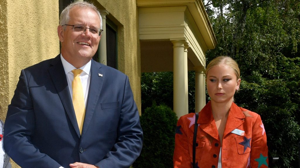Prime Minister Scott Morrison and 2021 Australian of the Year Grace Tame during a morning tea for state and territory recipients in the 2022 Australian of the Year Awards at The Lodge in Canberra. (AAP Image/Mick Tsikas) 
