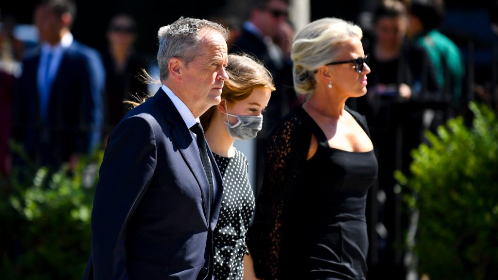Former leader of the Opposition Bill Shorten, wife Chloe Shorten and daughter Clementine arrive ahead of the funeral service for Senator Kimberley Kitching at St Patrick's Cathedral in Melbourne, Monday (AAP Image/Joel Carrett) 