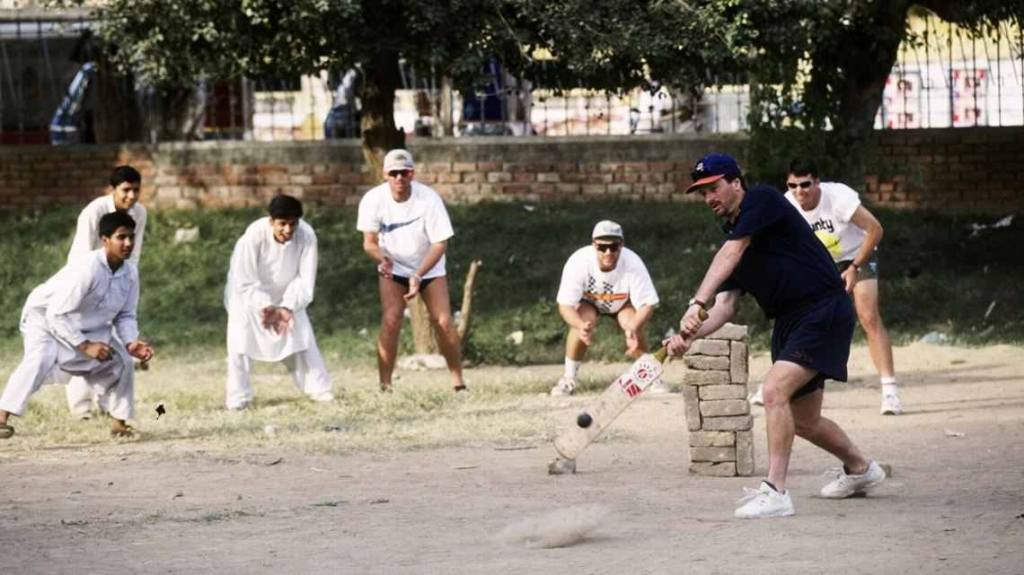 Steve Waugh plays street cricket with children in the streets of Pakistan during the 1994 tour. (Image: Facebook)