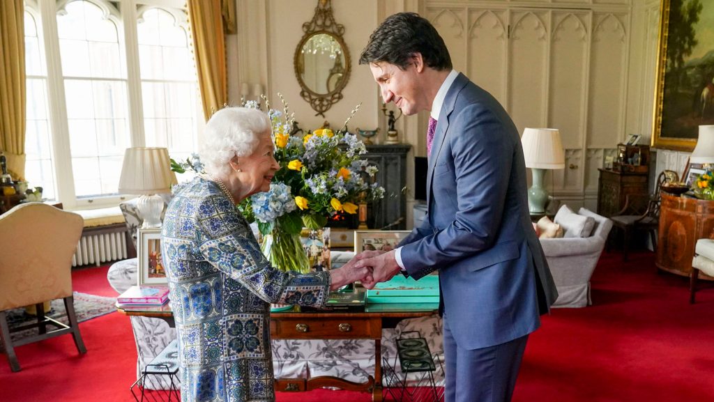 Britain's Queen Elizabeth II receives Canada's Prime Minister Justin Trudeau during an audience at Windsor Castle, Windsor, England, Monday March 7, 2022. (Steve Parsons/Pool via AP)