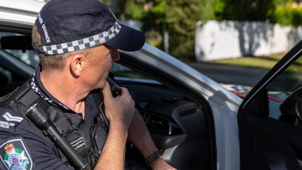 A man has been taken into custody after a truck rammed two police vehicles, leaving four police injured.