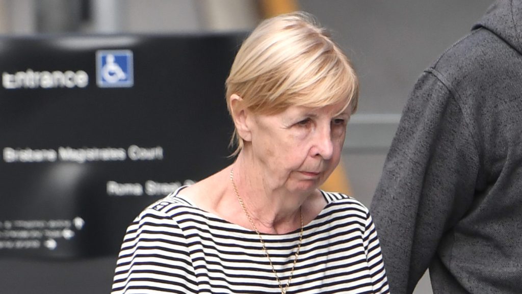 Sandra Balfour arrives at the Brisbane District Court in Brisbane, Wednesday, May 4, 2022.  Sandra Balfour, who is an accountant is being sentenced on a fraud charge.  (AAP Image/Darren England) NO ARCHIVING